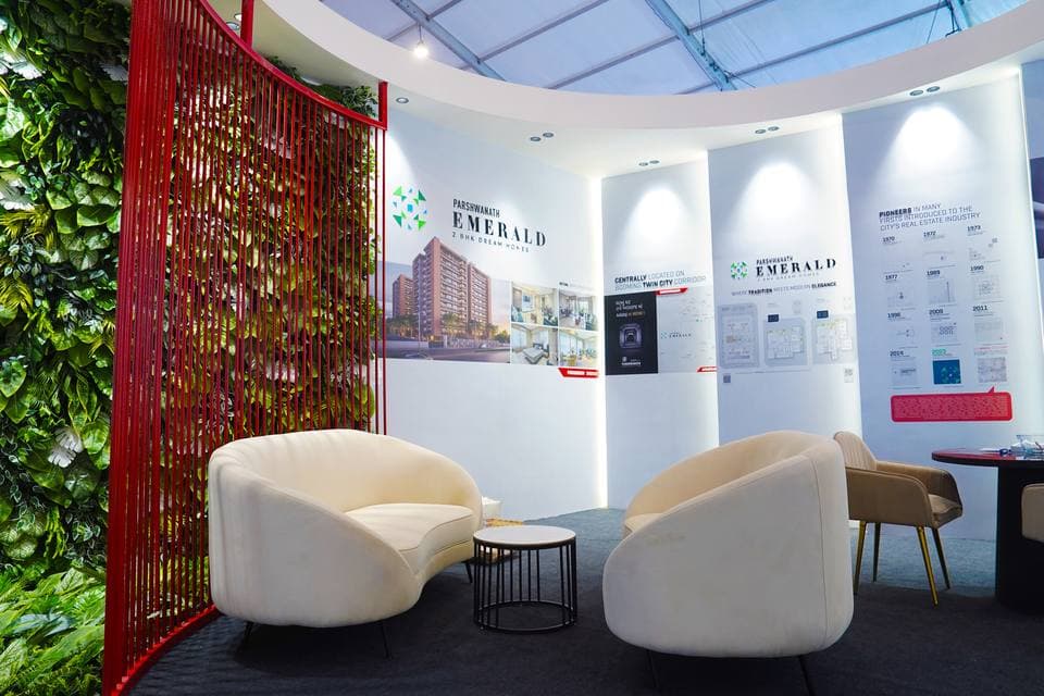 Premium booth interior with fluted laminate panels and concealed lighting