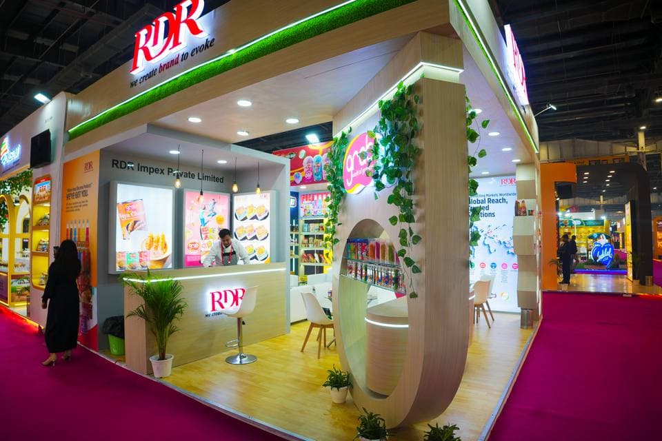 Completed large-format turnkey exhibition stand — full project delivery